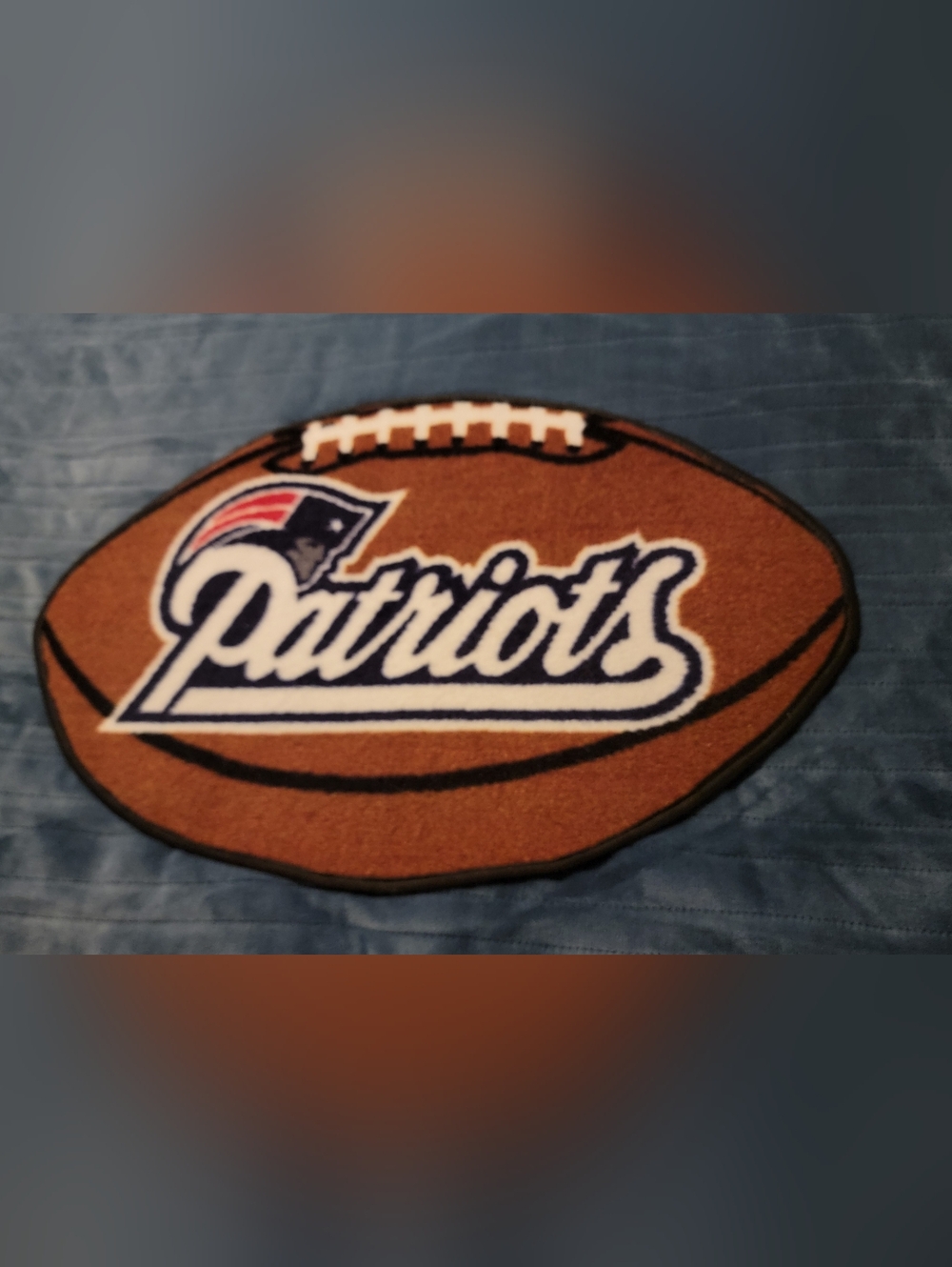 Like New-- New England Patriots Football Shaped Rug/mat